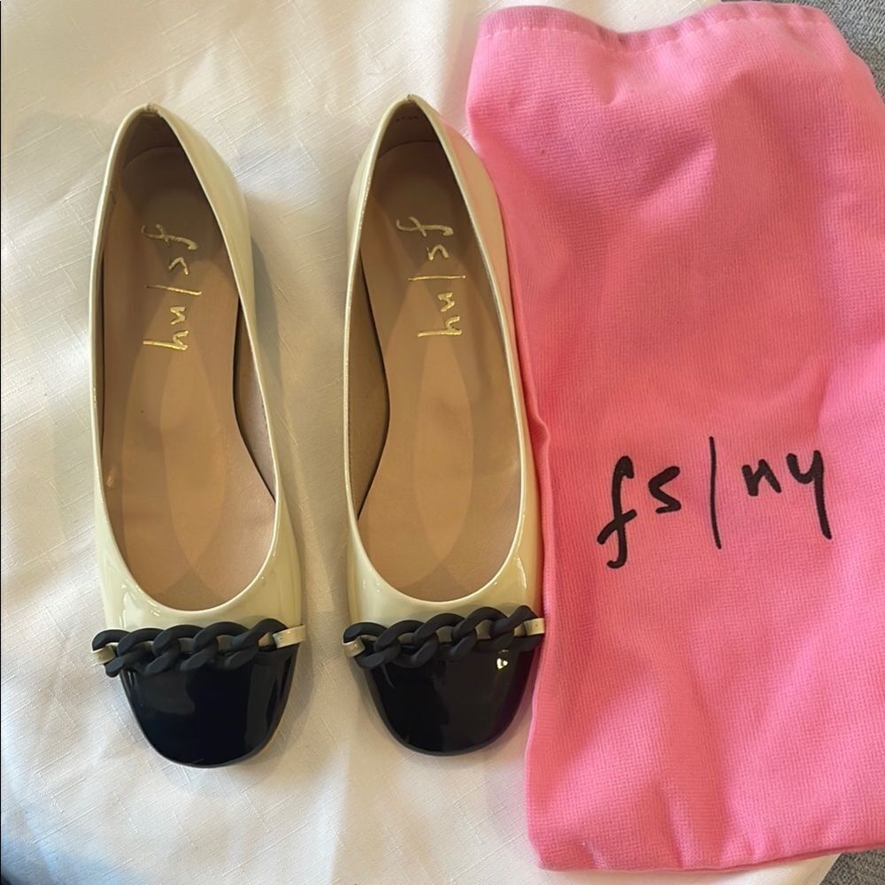 FRENCH SOLE BRAIDED FRONT DESIGN, FLATS ARE CREAM AND BLACK.   NEW IN BOX
